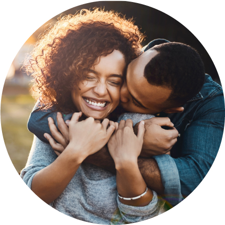 smiling couple embracing